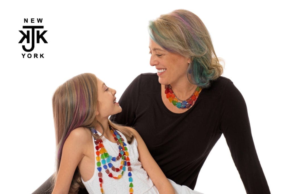 Designer Katherine Kornblau and her daughter smiling